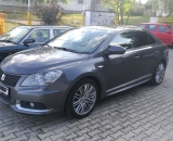 Suzuki Kizashi 2.4 118kW s italským BRC a válcovou nádrží v kufru.